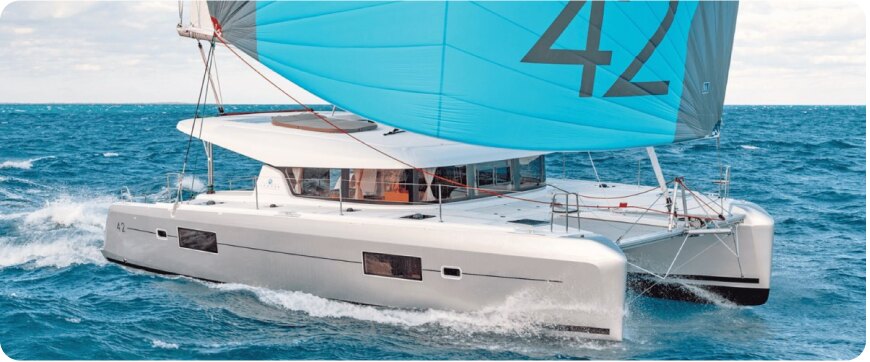 Sailing catamaran under gennaker