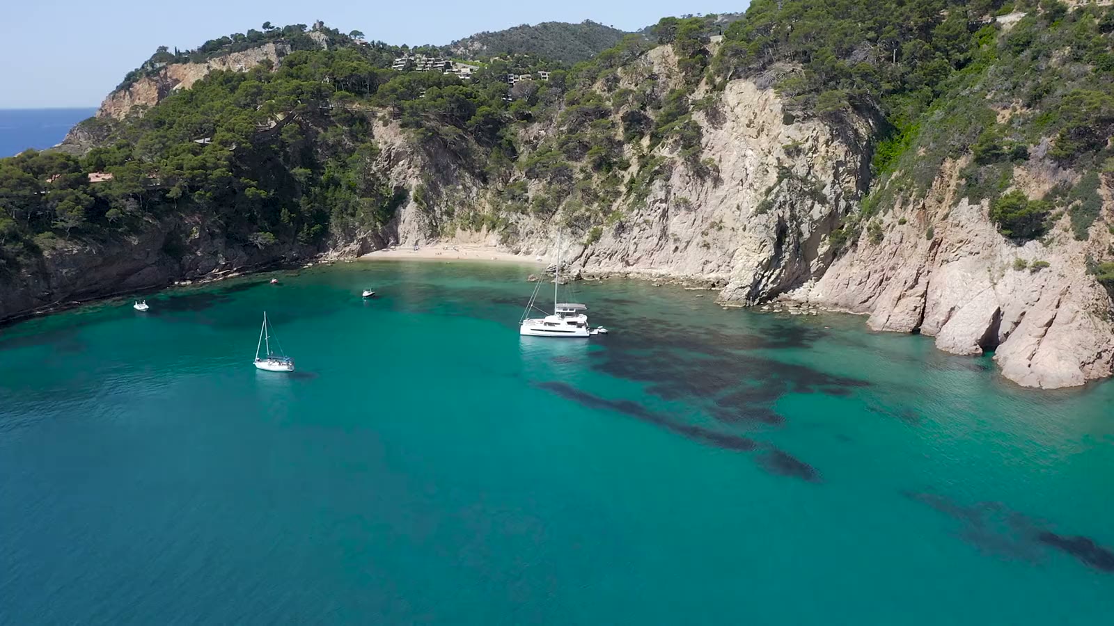 Sailing boat anchored in a bay